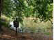 Picturesque resident fishing pond provides a tranquil outdoor experience surrounded by trees at 2804 Stillwater Park Dr, Marietta, GA 30066