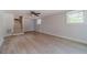Open basement floor plan features hard surface floors, stairs and windows for natural light at 3404 Broxton Mill Way, Snellville, GA 30039
