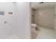 Modern bathroom with a step-in shower, white tile, and updated fixtures at 3404 Broxton Mill Way, Snellville, GA 30039