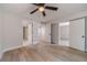 Spacious bedroom boasts hardwood floors, closet, and access to a bathroom at 3404 Broxton Mill Way, Snellville, GA 30039