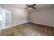 Bedroom view with closet, ceiling fan and access to a bathroom and the rest of the house at 3404 Broxton Mill Way, Snellville, GA 30039
