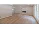 Bright living room with hardwood floors, recessed lighting, and fireplace at 3404 Broxton Mill Way, Snellville, GA 30039