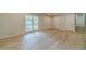 Bright living room with hardwood floors and neutral paint at 3404 Broxton Mill Way, Snellville, GA 30039