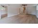 Spacious open-concept living area with stairs and a view to the entry and another room at 3404 Broxton Mill Way, Snellville, GA 30039