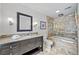 Bathroom with granite countertop, tub, shower, and decorative tile at 70 Old Ivy Ne Rd # 57, Atlanta, GA 30342