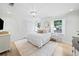 Bright bedroom with hardwood floors, white shutters and stylish decor at 70 Old Ivy Ne Rd # 57, Atlanta, GA 30342