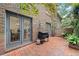 Cozy brick patio with a grill, perfect for outdoor dining and entertaining at 70 Old Ivy Ne Rd # 57, Atlanta, GA 30342