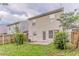 Fenced backyard with a small patio and green space, offering privacy at 257 Turnstone Rd, Stockbridge, GA 30281