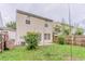Spacious backyard featuring a concrete patio and a fenced perimeter at 257 Turnstone Rd, Stockbridge, GA 30281