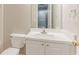 Small bathroom featuring a white vanity with a mirror, a toilet, and tile flooring at 257 Turnstone Rd, Stockbridge, GA 30281