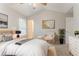 Stylish bedroom showcases vaulted ceilings and inviting furnishings, filled with natural light at 257 Turnstone Rd, Stockbridge, GA 30281