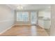 Dining area with stylish light fixture and lots of natural light at 257 Turnstone Rd, Stockbridge, GA 30281
