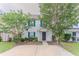 Inviting two-story home with green shutters and a large parking pad at 257 Turnstone Rd, Stockbridge, GA 30281