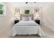 Beautiful bedroom with a plush queen bed, side tables, and calming neutral decor at 2871 Tucker Mill Sw Rd, Conyers, GA 30094