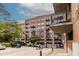Brick apartment building shows architectural details like arched windows and iron balconies at 3235 Roswell Ne Rd # 505, Atlanta, GA 30305