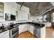 Well-equipped kitchen featuring stainless steel appliances, granite counters, and open concept design at 3235 Roswell Ne Rd # 505, Atlanta, GA 30305