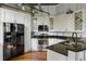 Contemporary kitchen with stainless steel appliances, granite countertops, and ample storage space at 3235 Roswell Ne Rd # 505, Atlanta, GA 30305
