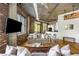 Inviting living space featuring exposed brick, ductwork, and hardwood floors at 3235 Roswell Ne Rd # 505, Atlanta, GA 30305