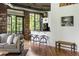 Cozy living space with barstool seating and balcony access, perfect for entertaining at 3235 Roswell Ne Rd # 505, Atlanta, GA 30305