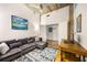 Comfortable living room featuring stylish decor, modern furnishings and exposed ceilings at 3235 Roswell Ne Rd # 505, Atlanta, GA 30305