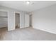 Bright bedroom with a large window, and ensuite bathroom showcasing the home's neutral color palette at 2426 Corner Shoals Dr, Decatur, GA 30034