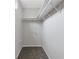 Walk-in closet with shelving and carpet flooring at 2426 Corner Shoals Dr, Decatur, GA 30034