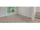Living room featuring wood-look floors and sliding glass door with access to the outside at 2426 Corner Shoals Dr, Decatur, GA 30034