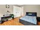 Bedroom with hardwood floors, desk, and a full sized bed at 281 Lakeshore Ne Dr, Marietta, GA 30067