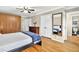 Spacious main bedroom with wood floors, walk-in closet, and en suite bathroom at 281 Lakeshore Ne Dr, Marietta, GA 30067