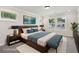 Staged main bedroom featuring hardwood furniture at 5120 Kongoni Ct, Cumming, GA 30041
