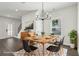 Staged dining area with stylish table, chandelier, and modern decor at 5120 Kongoni Ct, Cumming, GA 30041
