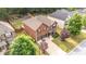 Aerial view of a home with a landscaped front yard and a two-car garage at 8744 Hamil Ct, Douglasville, GA 30135