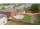 Private backyard featuring a paver patio with retaining wall and a wood fence at 8744 Hamil Ct, Douglasville, GA 30135