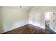 Bedroom with hardwood floors and easy access to the attached bathroom for added convenience at 8744 Hamil Ct, Douglasville, GA 30135