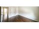 Comfortable bedroom with hardwood floors, neutral walls, and convenient doorway access at 8744 Hamil Ct, Douglasville, GA 30135