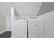 A laundry room featuring a full-sized washer and dryer at 1844 Stanton St, Decatur, GA 30032
