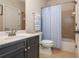Inviting bathroom features a vanity with a sink, and a shower-tub combo at 2025 Eagle Rdg, Roswell, GA 30076
