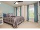 Cozy bedroom with soothing colors, natural light, and neutral carpet at 2025 Eagle Rdg, Roswell, GA 30076