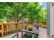 Inviting deck surrounded by lush greenery, offering a peaceful outdoor space at 2025 Eagle Rdg, Roswell, GA 30076