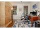 Bright office with a large desk, hardwood floors and a lovely cabinet with great natural light at 2025 Eagle Rdg, Roswell, GA 30076