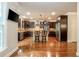 Spacious kitchen featuring dark wood cabinets, stainless steel appliances, and an island at 2025 Eagle Rdg, Roswell, GA 30076
