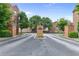 Community entrance with brick pillars and manicured landscaping at 3386 Vintage Se Cir # 8, Smyrna, GA 30080