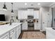Modern kitchen boasting stainless steel appliances, white cabinets, and ample counter space at 3386 Vintage Se Cir # 8, Smyrna, GA 30080