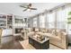 Inviting living room with fireplace, built-in bookshelves, and a comfortable sectional sofa at 3386 Vintage Se Cir # 8, Smyrna, GA 30080
