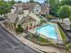 Aerial view of a clean, sparkling swimming pool and lounge area at 3386 Vintage Se Cir # 8, Smyrna, GA 30080