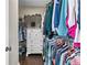 Spacious walk-in closet providing ample storage space with shelving and hanging rods at 3386 Vintage Se Cir # 8, Smyrna, GA 30080