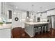 Spacious kitchen with an island, stainless steel appliances, and a breakfast bar at 4115 Williams Point Dr, Cumming, GA 30028