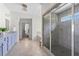 Large main bathroom with a glass-enclosed shower and double vanity, creating a spa-like retreat at 4115 Williams Point Dr, Cumming, GA 30028