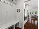 Mudroom entry featuring a bench with storage and access to the kitchen at 4115 Williams Point Dr, Cumming, GA 30028