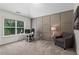 Comfortable office space with a large window, modern decor, and plush carpet at 4115 Williams Point Dr, Cumming, GA 30028
